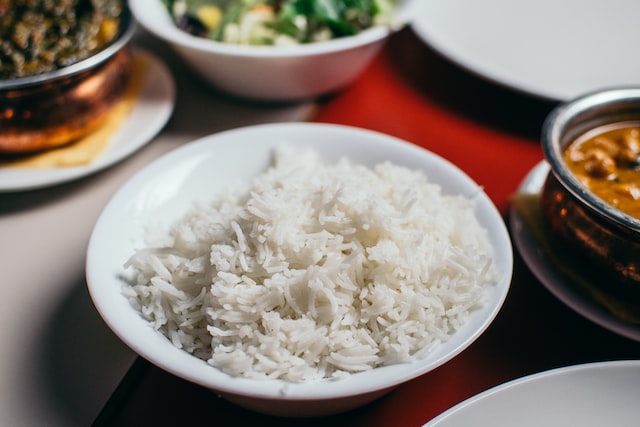 an image of cooked rice on a white plate